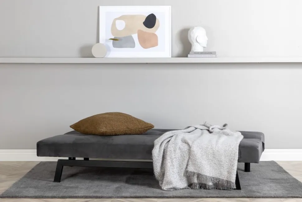 Bäddsoffa i mörkgrå sammet + Möbeltassar