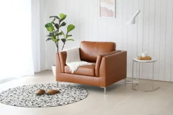Fåtölj cognacs färgat konstläder - Cansas + Fläckborttagare för möbler