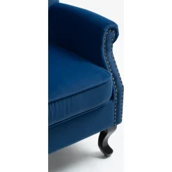 Öronlappsfåtölj i blått sammet