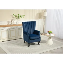 Öronlappsfåtölj i blått sammet