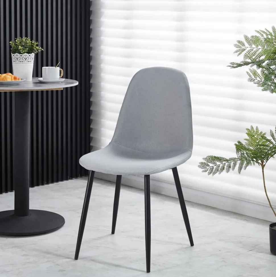 Stol i grått tyg - Carisma + Textilrengöring för möbler