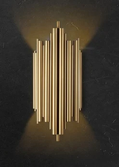 Vägglampa i guldutförande - Munspel